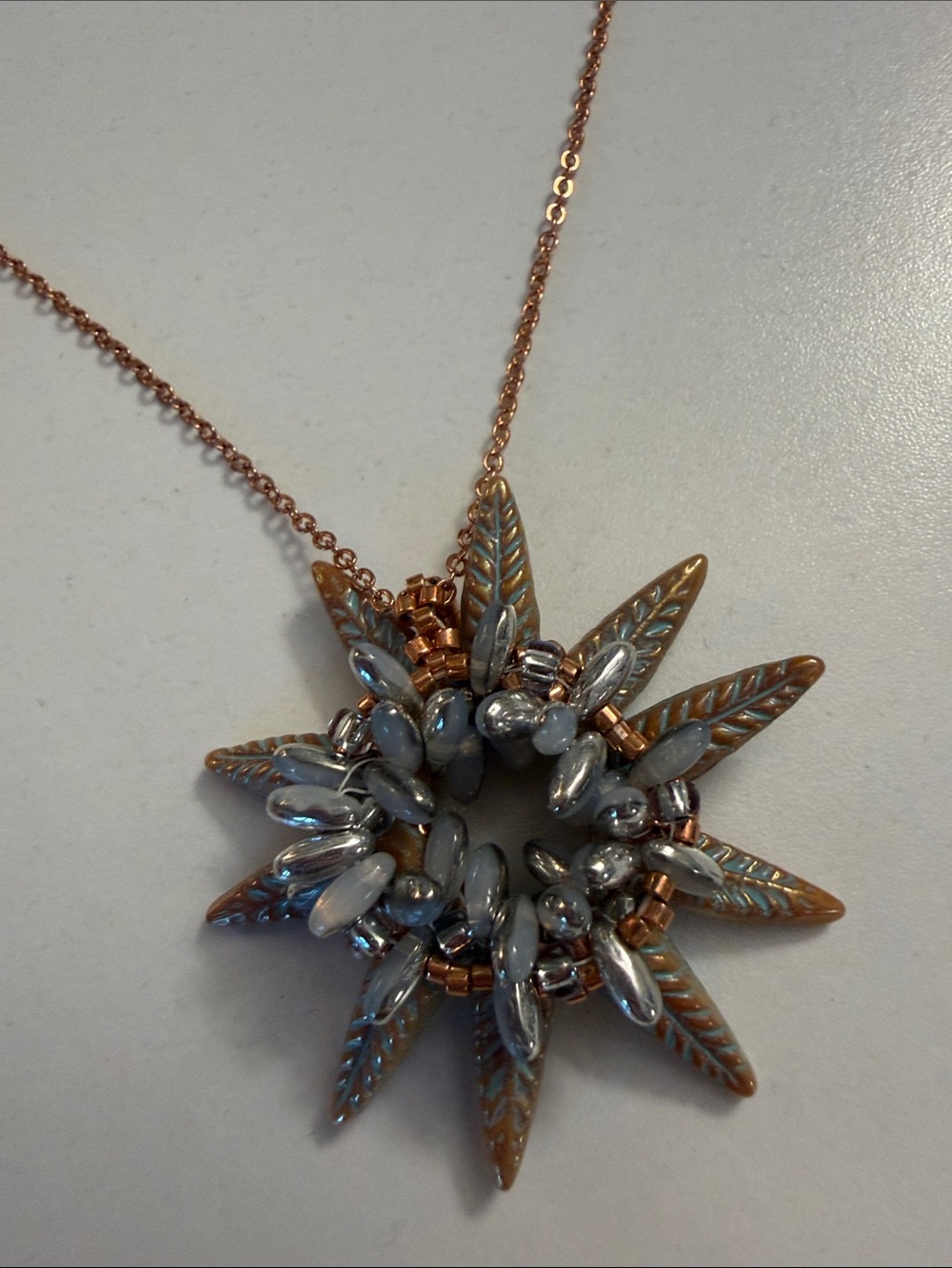 Delicate Rose Gold Sunburst Pendant Necklace - Blue Accents